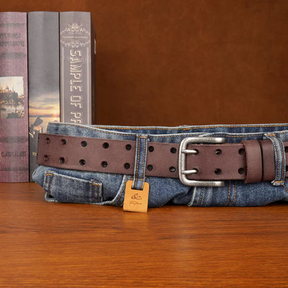 Crafted from full-grain cowhide, featuring a classic brass buckle.