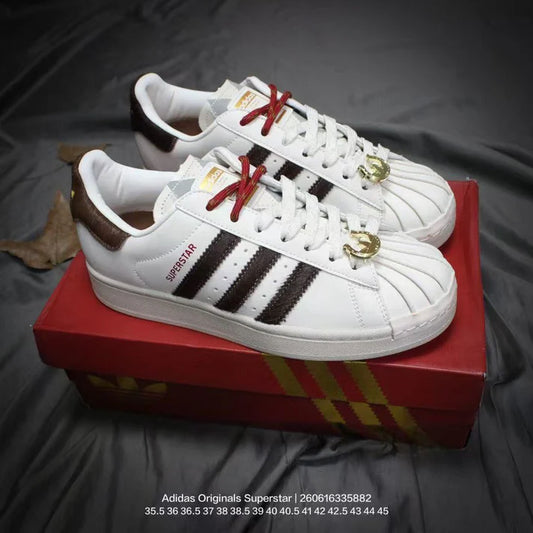 Sneakers—low-top casual sneakers; stylish, comfortable, lace-up walking shoes.