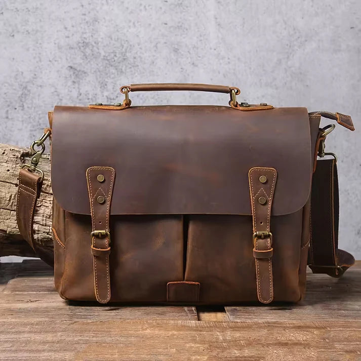 Vintage Genuine Leather Men's Briefcase, featuring an adjustable shoulder strap, gold-tone hardware, and a zippered closure