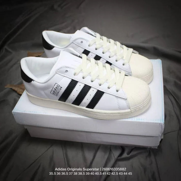 Sneakers—low-top casual sneakers; stylish, comfortable, lace-up walking shoes.